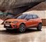 En orange SEAT SUV i solen