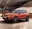 En orange SEAT SUV i solen