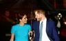 Harry og Meghan under paraply