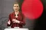 Mette Frederiksen i rødt jakkesæt til pressemøde onsdag aften. 