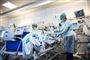 personale og patient på hospitalsstue
