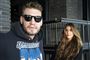 nicklas bendtner med solbriller og kæresten philine i baggrunden 