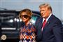 Melania og Donald Trump den sidste dag på vej op i et fly