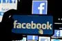 Facebooks blå logo på en mobiltelefon.