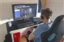 person sidder ved en computer