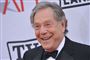 skuespilleren George Segal smiler