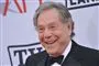 skuespilleren George Segal smiler