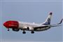 Et Norwegian-fly på vej til landing