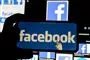 Facebook-logo på mobiltelefon