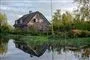 Et stort idyllisk hus med flagstang og sø i baghaven.