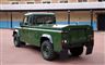 En mørkegrøn Land Rover lavet som rustvogn