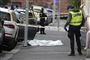 politi til stede ved skuddrab på gaden i Oslo