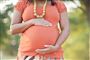 En kvinde med en gravid mave.