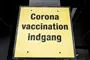 skilt ved indgang til coronavaccination
