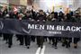 Men In Black protesterede lørdag under, hvad bevægelsen kalder et begravelsesoptog for frihedsrettighederne.