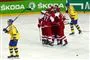 ishockeyspillere jubler på isen