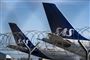 sas-fly står på jorden