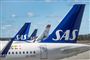 Haleroret på et fly, med SAS-logo