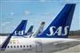 Haleroret på et fly, med SAS-logo