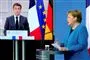 angela merkel taler fra talerstol 