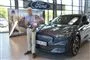 Uwe Holmsgaard står ved sin nye Mustang