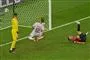 En fodboldspiller scorer mål for Danmark