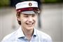 En smilende ung student