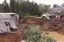 Et kæmpe mudderskred og ødelagte huse