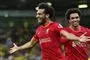 Jublende Liverpool-spillere på banen