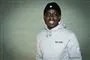 melvin kakooza poserer og smiler 