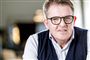 rolf sørensen iført vest og briller 