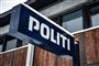 politilogo på bygning