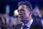 anders fogh iført jakke og slips