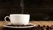 kaffekop med bønner 