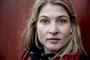 Portrætbillede af Christina Krzyrosiak Hansen. Hun kigger direkte ind i kameraet.