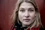 Portrætbillede af Christina Krzyrosiak Hansen. Hun kigger direkte ind i kameraet.