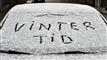 bilrude med vintertid skrevet i sne