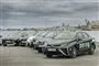 En række Toyota-taxier på en kaj i København