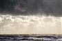 Skyer over havet
