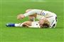 Der var ikke spillet lang tid af opgøret mellem Genoa og AC Milan, før Simon Kjær faldt til jorden med en skade.