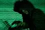En mand i profil der ligner en hacker