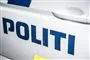 siden af en politibil.