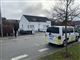 politibil foran hus