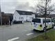politibil foran hus