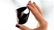 kvinde holder sort diamant