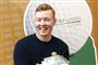en smilende ung mand