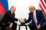 putin og trump giver hinanden hånden