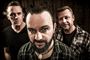 Bandet Dizzy Mizz Lizzy med Tim Christensen i forgrunden.