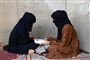 Afghanske piger studerer i hjemmet i Kandahar. 