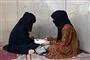 Afghanske piger studerer i hjemmet i Kandahar. 